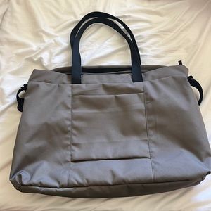 Warm charcoal Everlane renew transit weekender